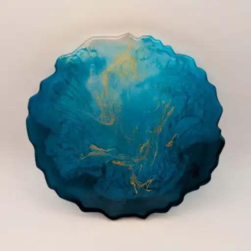 Dessous de verre en forme de géode couleur bleu océan avec  une touche d'or 